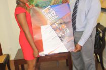 President Richardson presented with official poster of the St. Martin Book Fair 2012