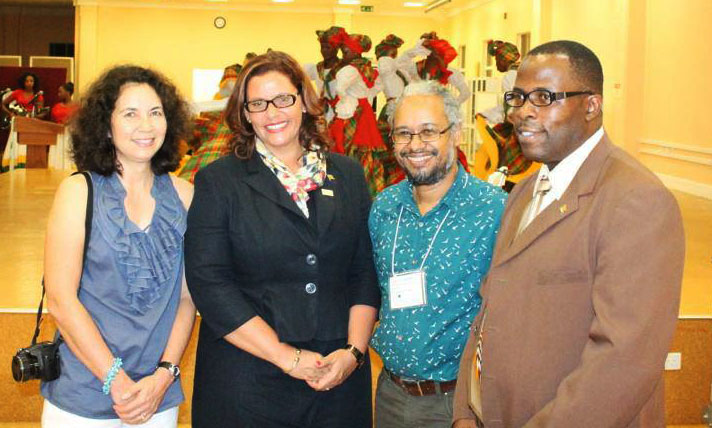 (Left to Right) Lisa Sorenson, Past President of the Society; Hon. Alexandra Otway-Noel, Minister for Tourism, Civil Aviation and Culture in Grenada; Dr. Howard Nelson, President of the SCSCB; Hon. Winston Garraway, Senator- Ministry Of National Security, Public Administration, Disaster Management, Home Affairs, Information And Implementation.  Photo Credit: SCSCB