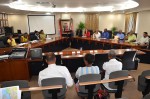 L to R, Members of the Cay Bay Community Council and Minister Maurice Lake and members of his Cabinet (on the right). DCOMM Photo