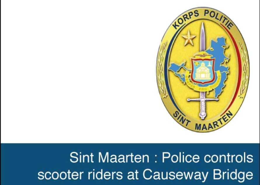 Sint Maarten. Police controls scooter riders at Causeway Bridge