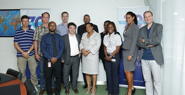 SXM team poses for a photograph with the visiting IMF delegation